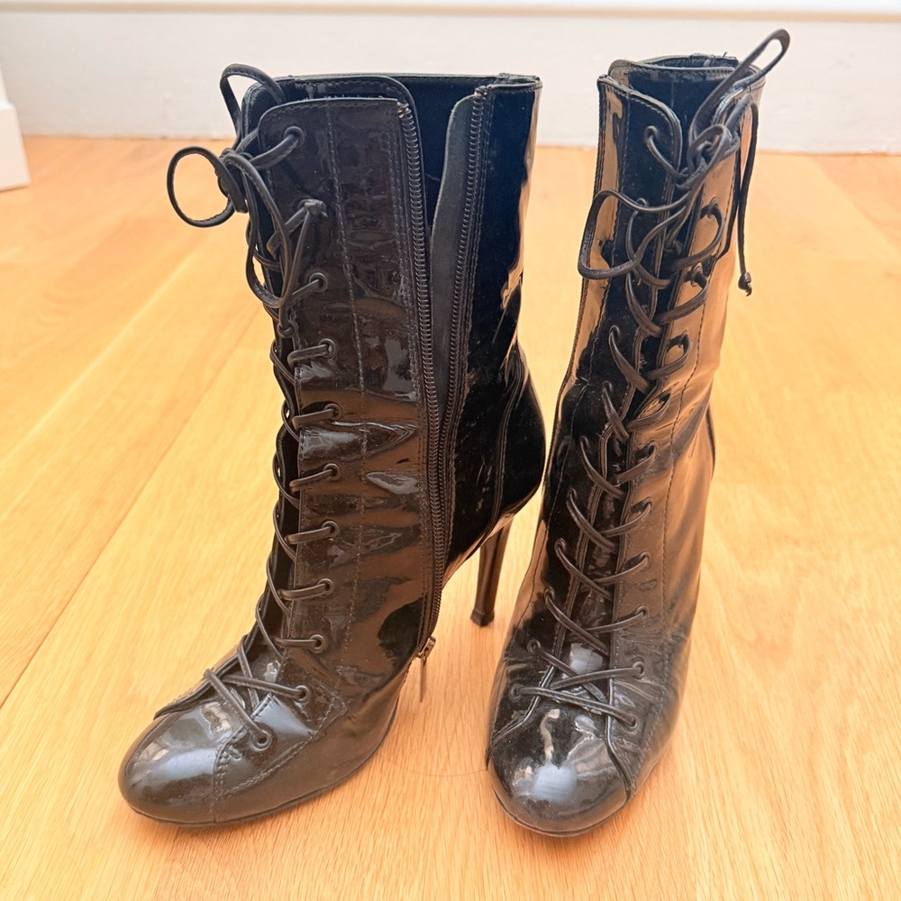 Beautiful black patent leather laced up boots, stiletto heels ; size  7.5